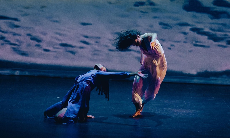 Photo of two dancers performing in Mareas/Tides, photo: Mike Eltringham.