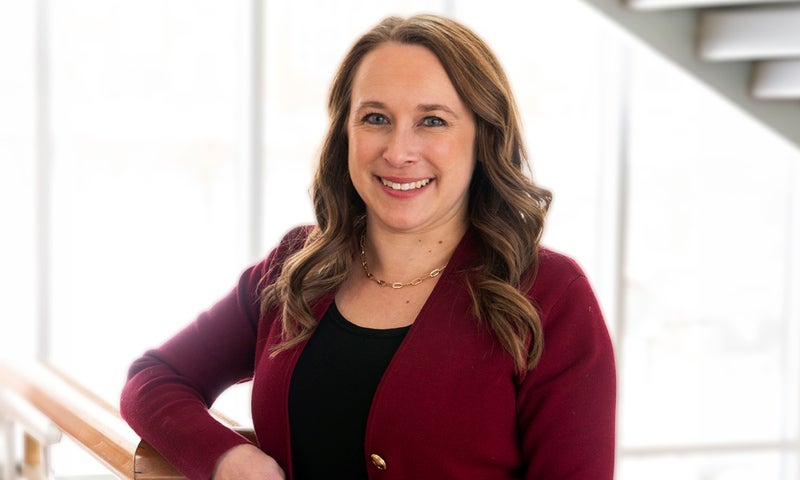 Associate Professor of Economics Emily Marshall ’10 poses for a photo.