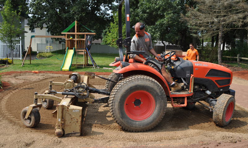 Denison groundskeeping staff building the field