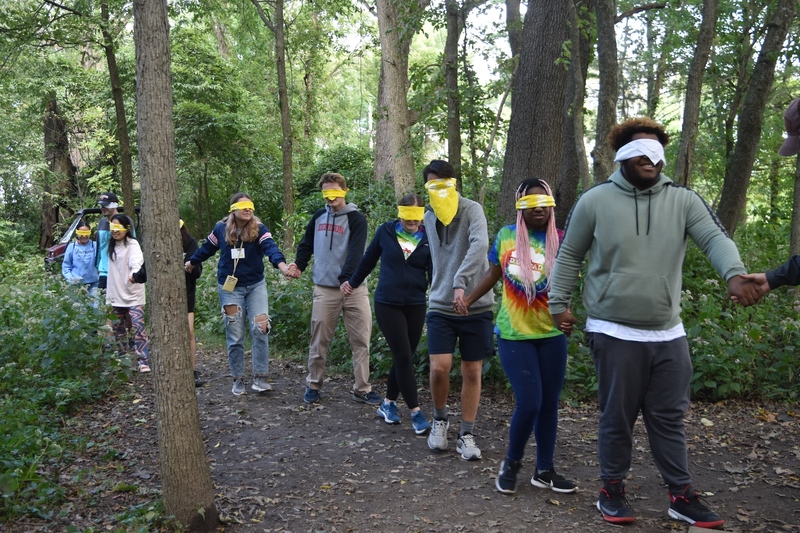 Blindfolded students during a team building exercise