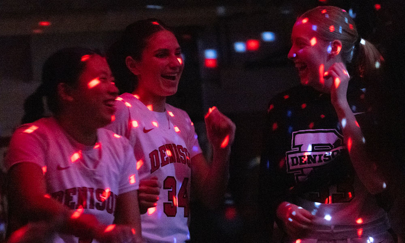 Women's Basketball team doing pre-game ritual.