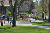 Students walking from chapel walk to academic quad