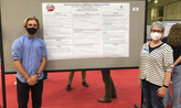 Blake Glatley and mentor Andrea Lourie with his summer research poster