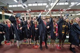 Denison students graduation in cap and gown