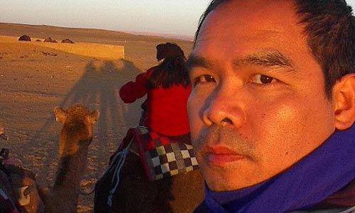 Photo of essayist and fiction writer Andrew Lam