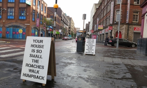 City streets with sidewalk signs