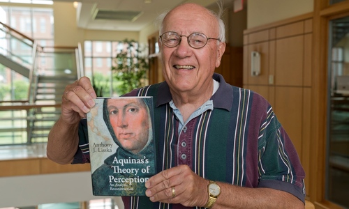 Tony Lisska with his book on Aquinas theory of perception