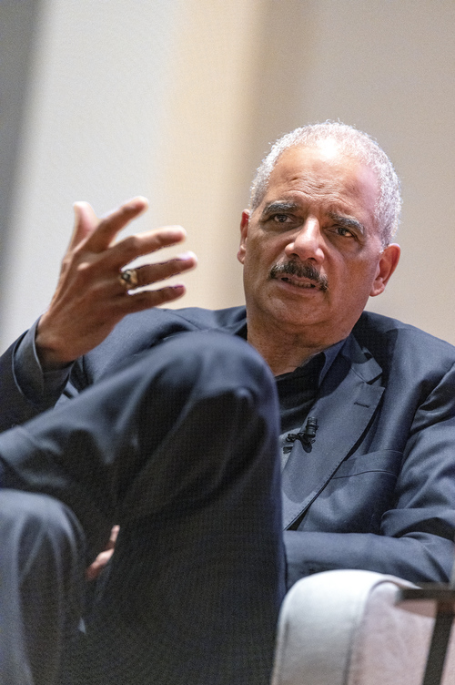 Eric Holder speaking to an audience