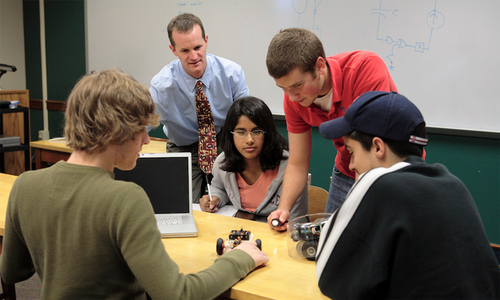 Students studying robotics