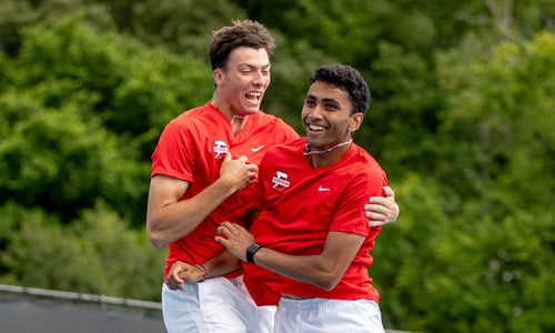 Ethan Green ’26 and Kael Shah ’26 celebrate their NCAA doubles championship win. (Photo: Stockton Photos)