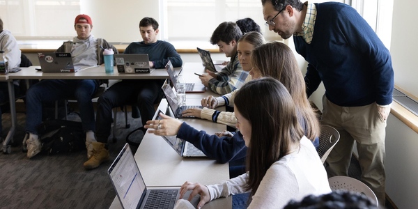 Professor and students in the classroom.