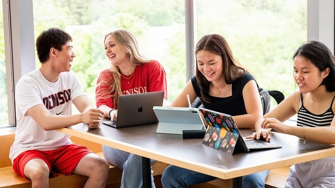 Students chatting around a table