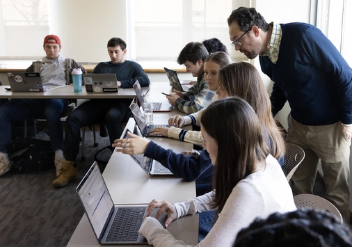 Professor and students in the classroom.