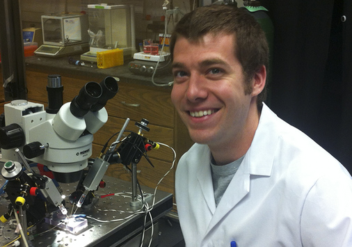 Adam Van Dyke, '08, in the lab.