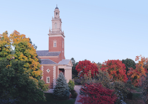 Swasey Chapel in the fall, with red tree colors
