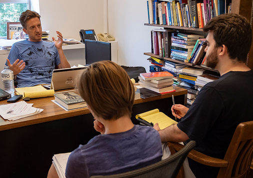 Professor John McHugh, Benjamin Keefer '19 and Audrey Kirkley '20