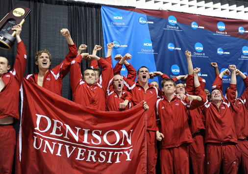The Denison men’s swim team celebrates its first NCAA championship in Knoxville, Tennessee