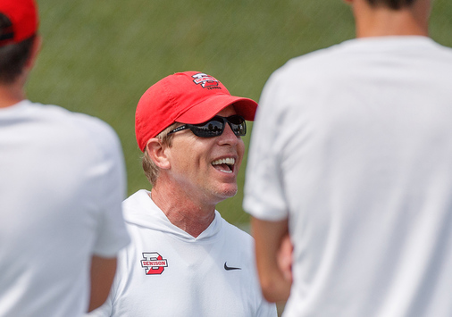 David Schilling ’89 laughs with players