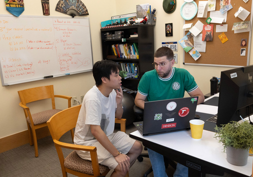 Duy Anh Nguyen ’27 and Alexandre Scarcioffolo meeting in a faculty office.