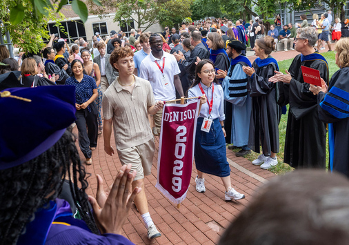 Members of Denison's faculty applaud a procession of the Class of 2029 prior to the start of Denison's Induction ceremony.