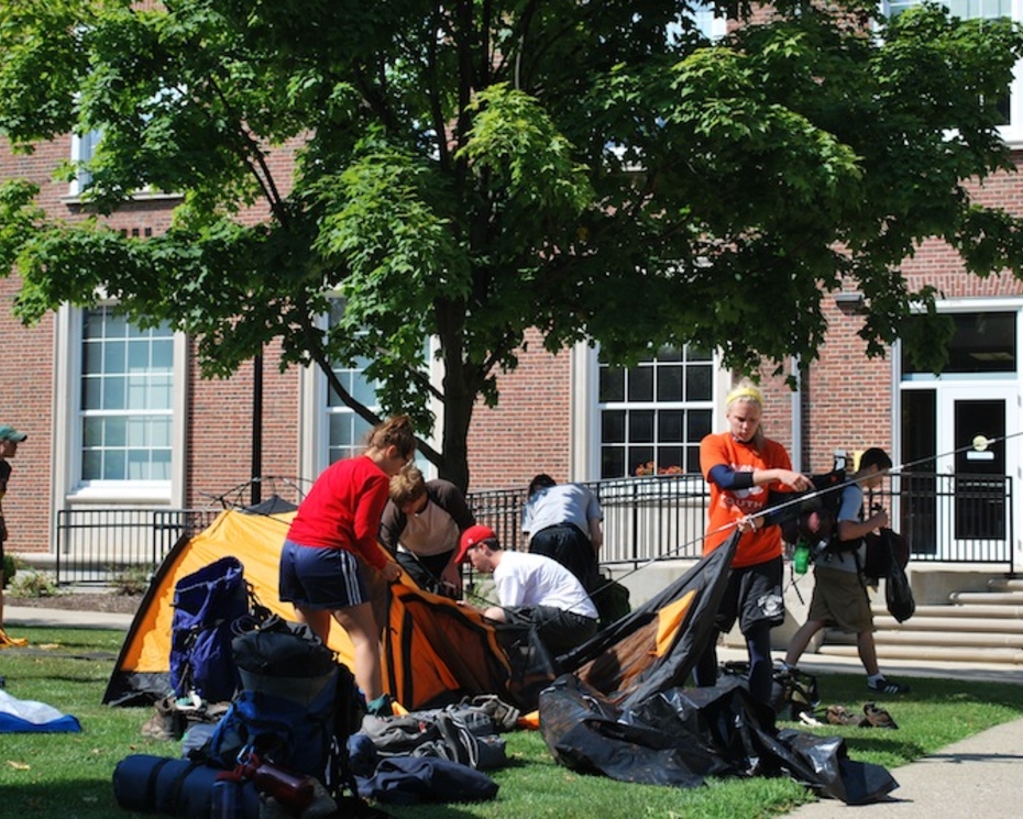Students packing tents