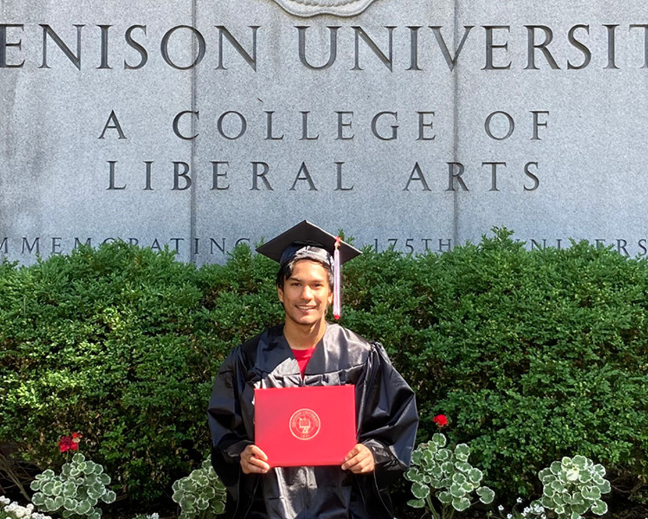 Taka Higuchi '20 celebrating commencement