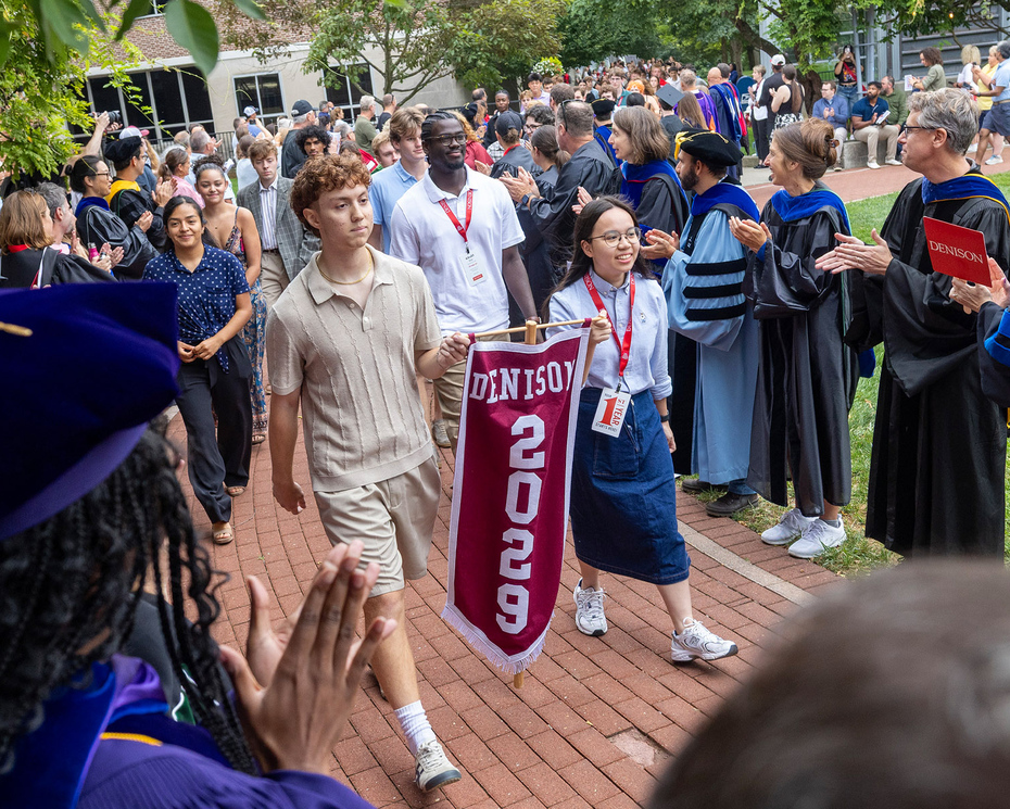 Members of Denison's faculty applaud a procession of the Class of 2029 prior to the start of Denison's Induction ceremony.