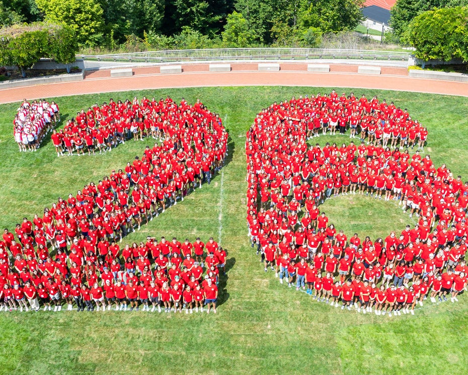 Aerial photo of the Class of 2026 forming a large "'26" on Reese~Shackelford Common
