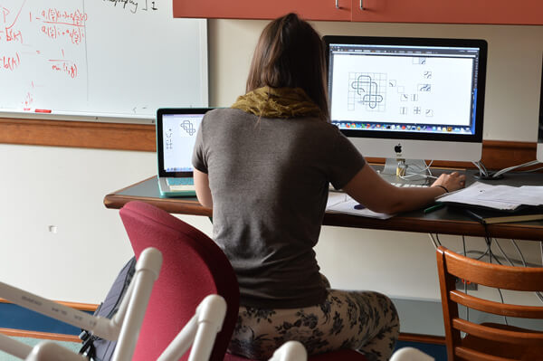 Summer Scholar Amanda Peiffer at computer
