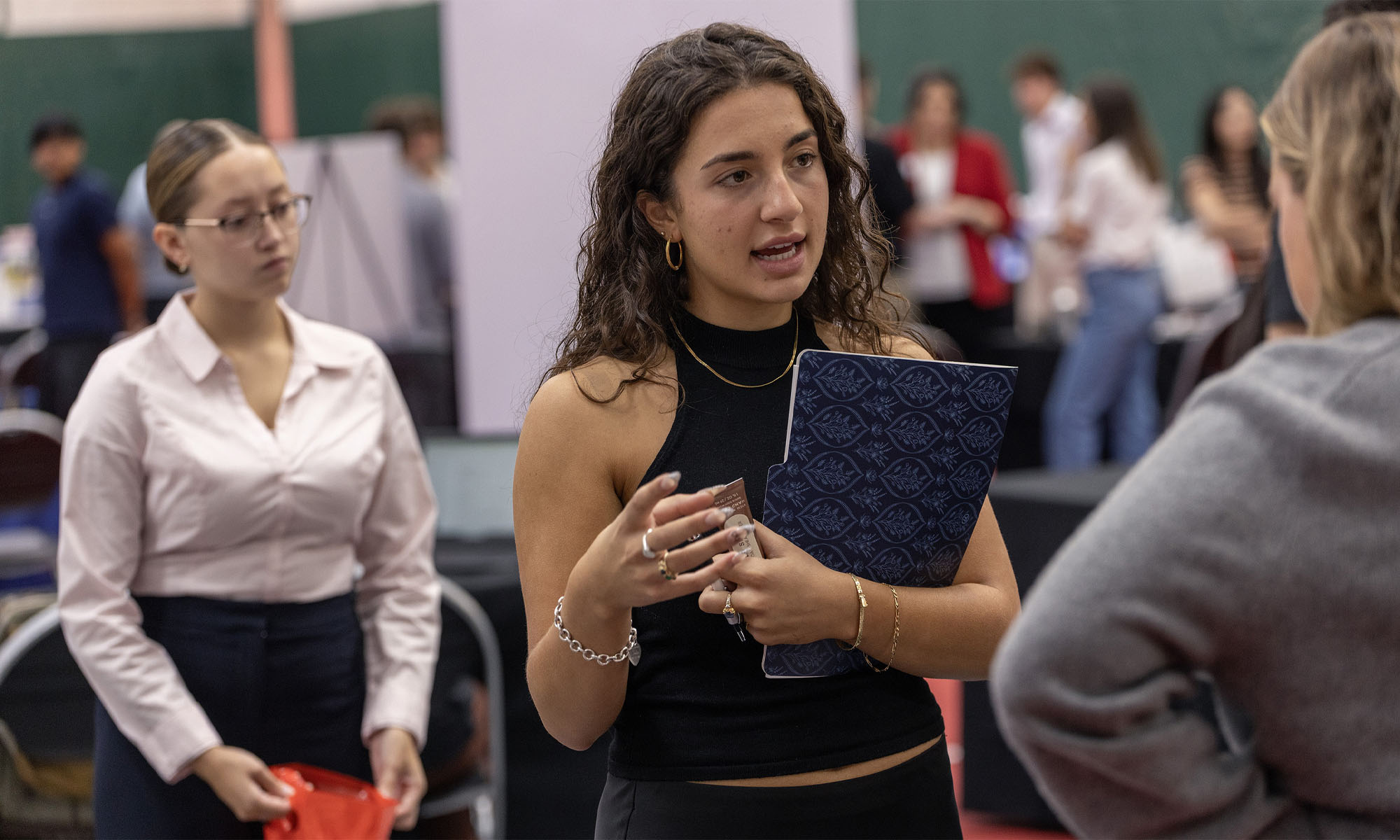 A student meets with a company rep at the Career Expo.