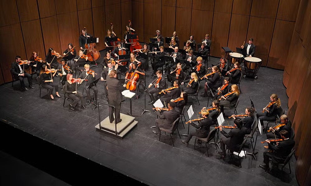 A stage filled with musicians.