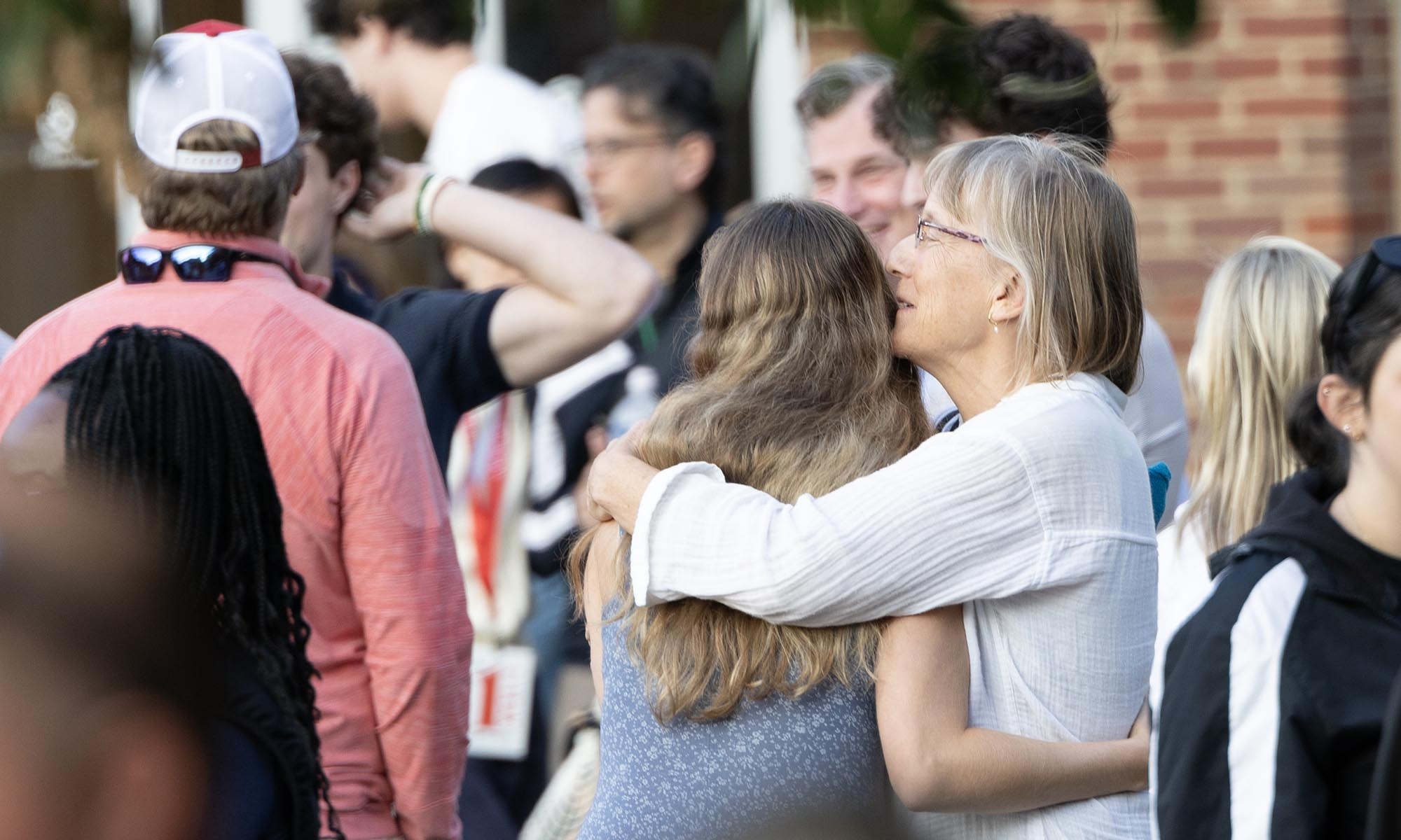 Student hugging a parent.