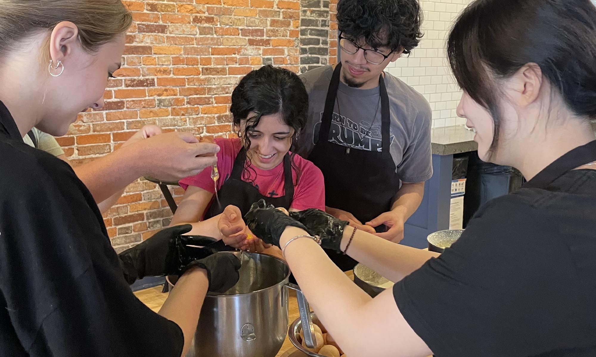 Students learning culinary techniques