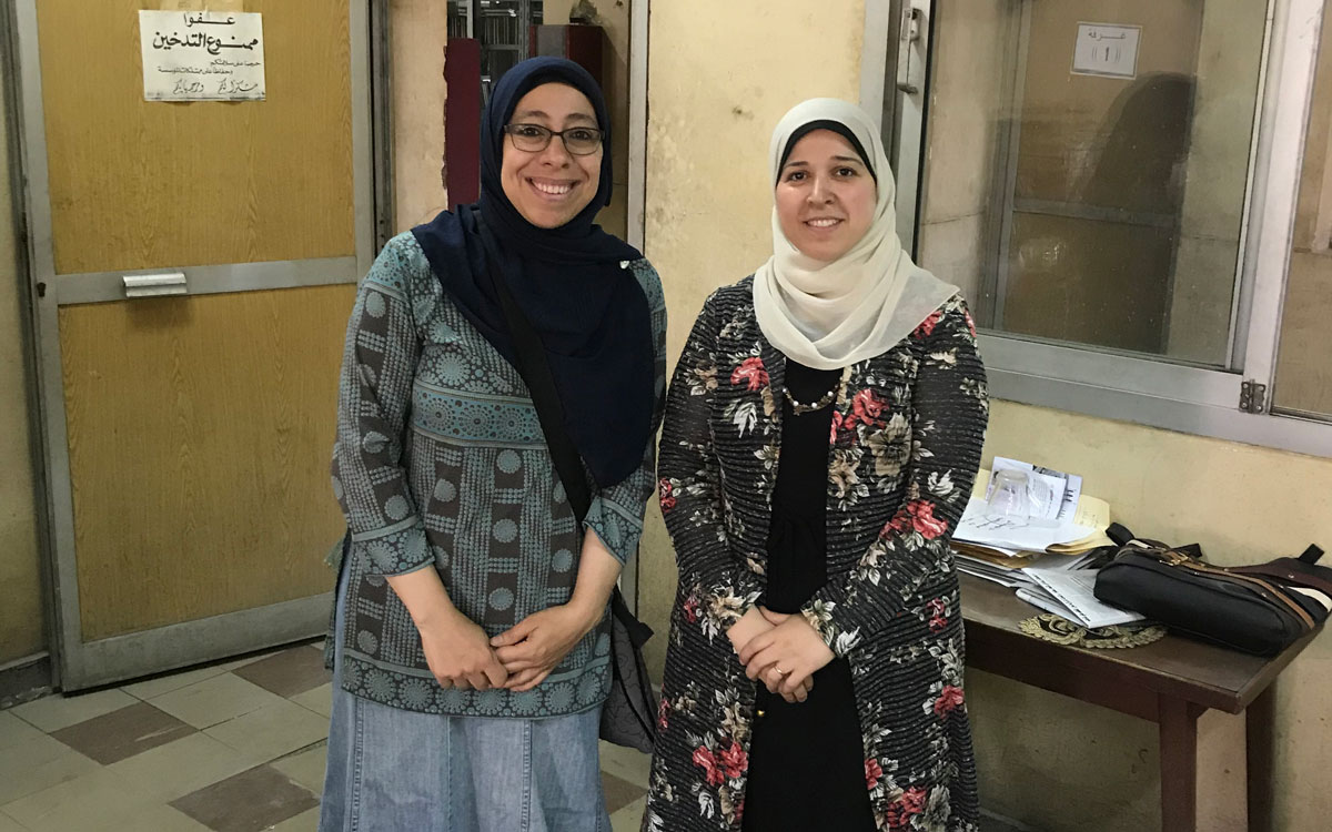 Two women smiling for camera