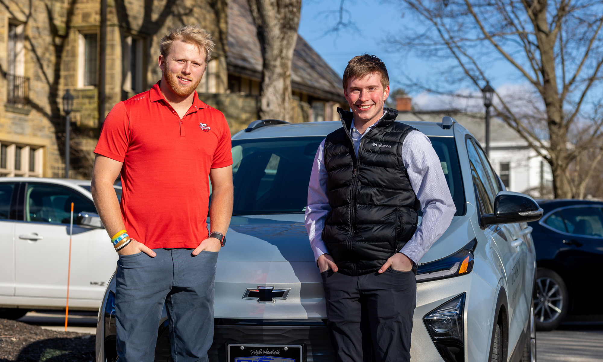 Chase King '25 and Colin Ravin '25 with the electric vehicle