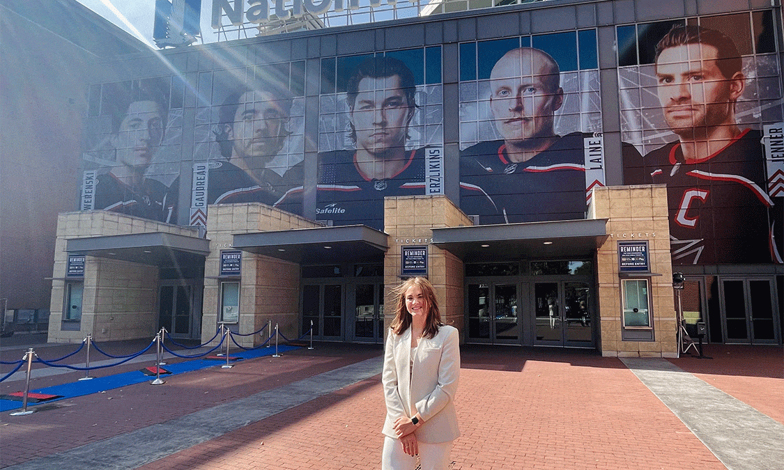 Abby standing in front of Nationwide Arena
