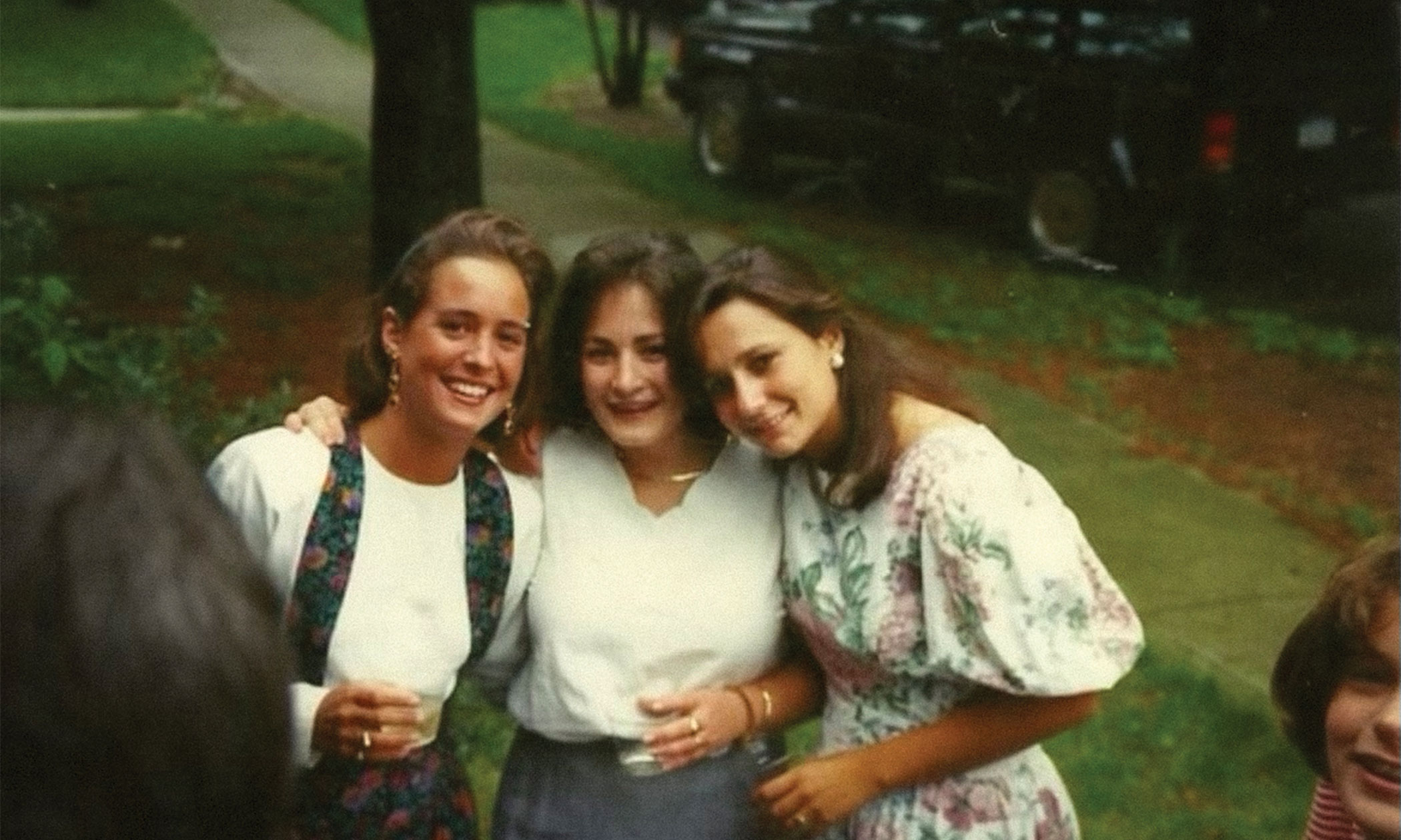 From left: Amy Baumstark Stivers, Katie McConnell Oliver, and Monica Weakley at a 1990 commencement party. 