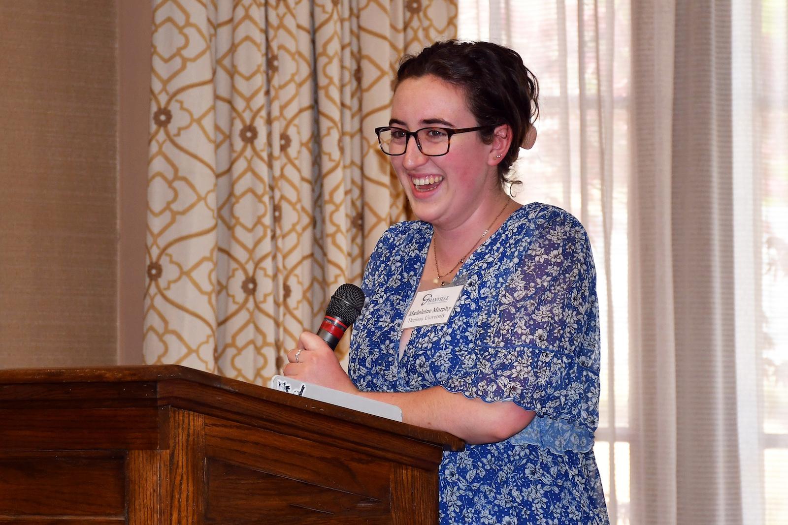 Maddy Murphy '23 at the podium after receiving the 2023 Kussmaul Award