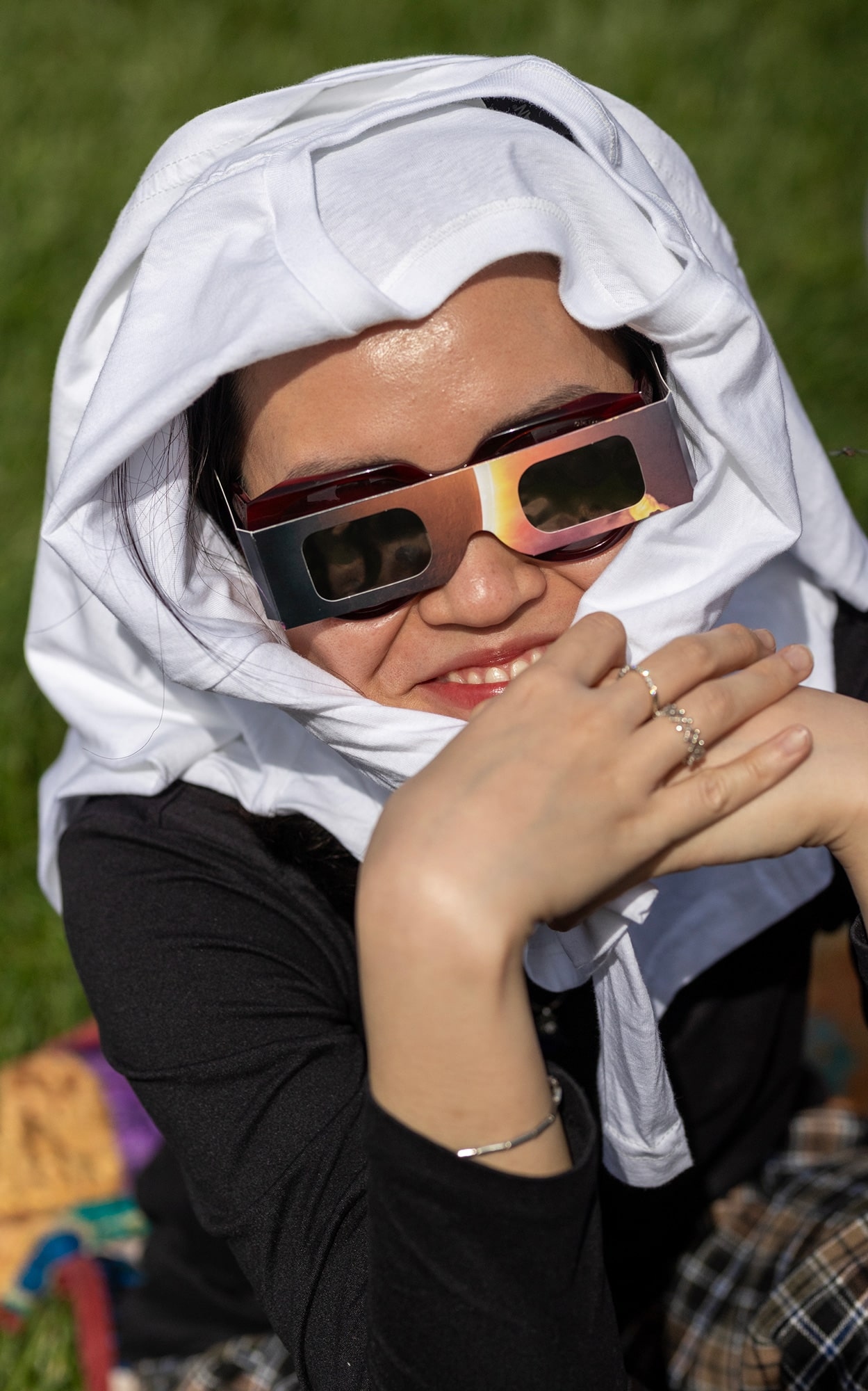 Student watching the solar eclipse