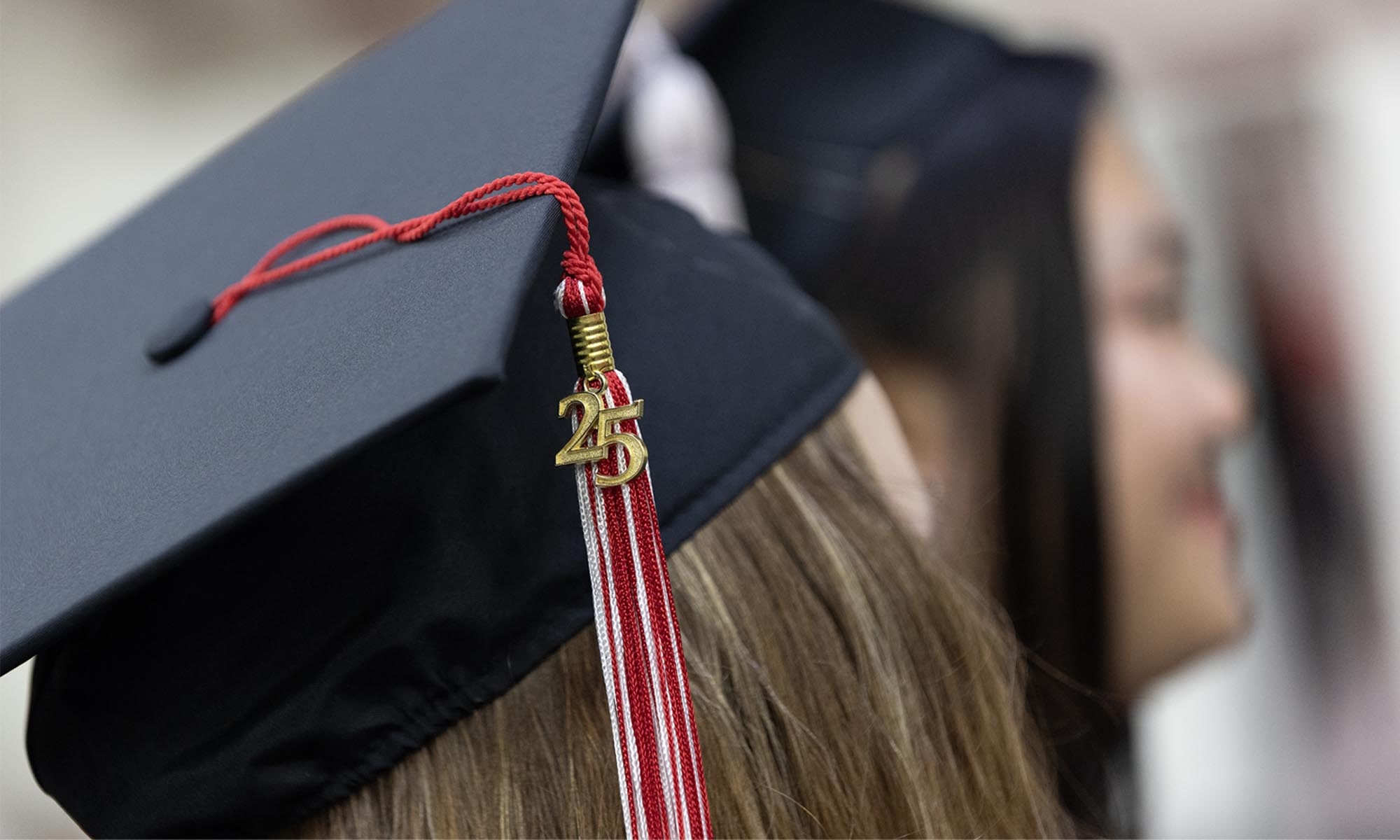 Photo of a graduate's cap with a 2025 tassel. 