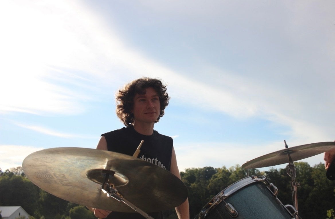 Mick Smith plays the drums.