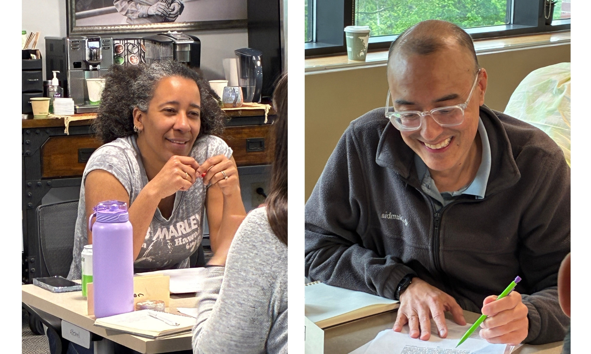 Two people sit at desks, engaged in conversation and writing. One woman smiles with hands clasped, while a man with glasses writes with a green pencil.