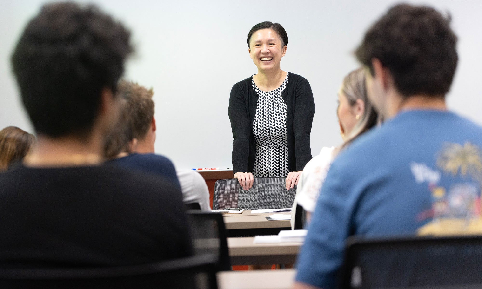 Photo of a May Mei teaching a class.