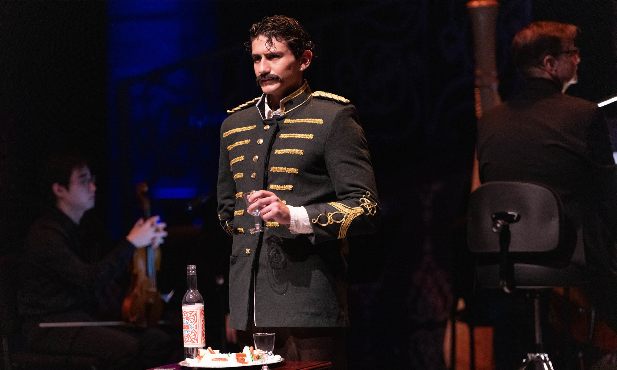 Denison Music Theatre student in costume on stage.