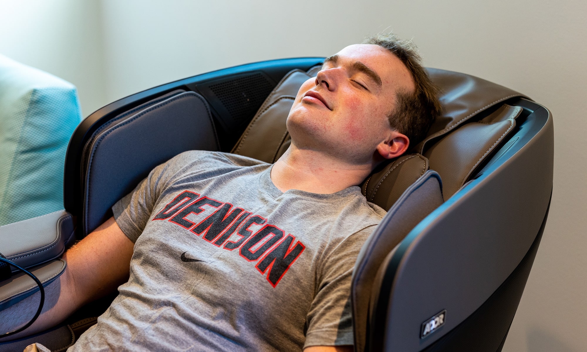 Student in a massage chair