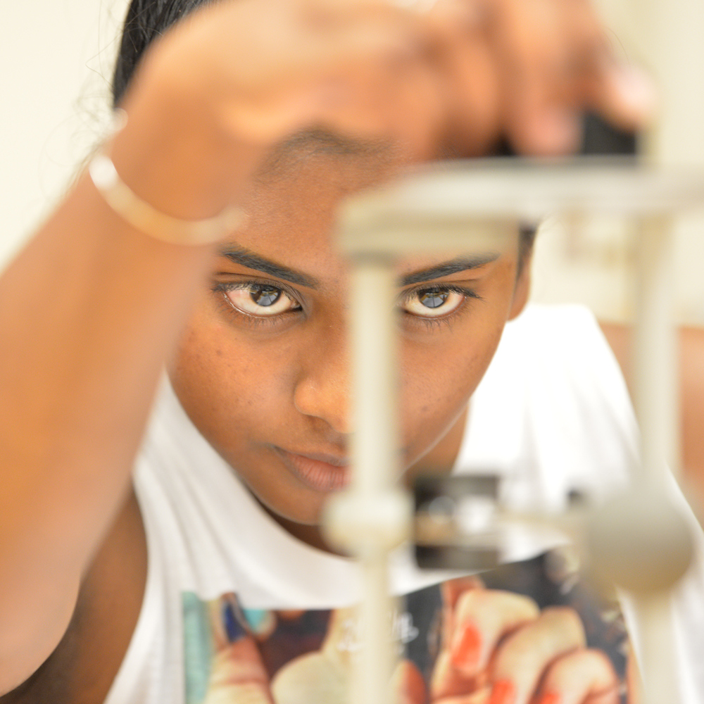 Student conducting an experiment