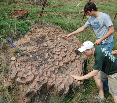 Louis Wersan and Don Yezerski examine deformed mudcracks