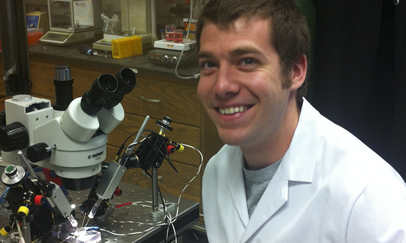 Adam Van Dyke, '08, in the lab.
