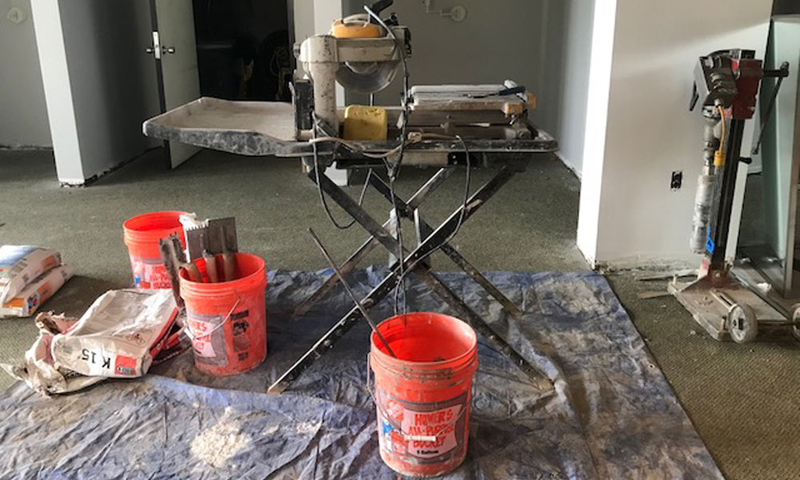 Paint buckets and other renovation materials