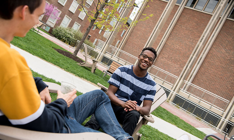 Students chatting on the academic quad